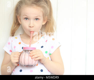 Beautiful girl drinking smoothie shake Stock Photo