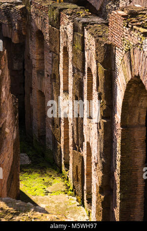 Interior closeup detail of he Colosseum or Coliseum, also known as the Flavian Amphitheatre, with the below ground level hypogeum, Rome. Lazio. Italy.