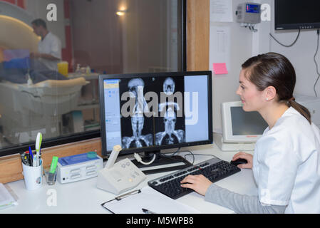 doctor checking patients brain scans Stock Photo