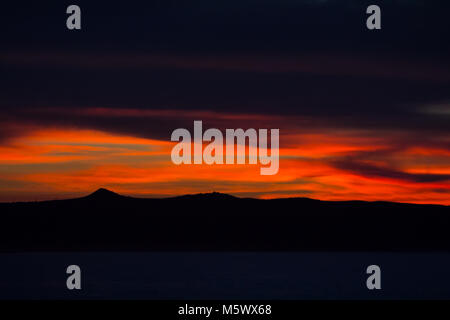 A stunning and colorful sunrise over Land's End at the southern tip of the Baja Peninsula at Cabo San Lucas, Baja California Sur, Mexico Stock Photo