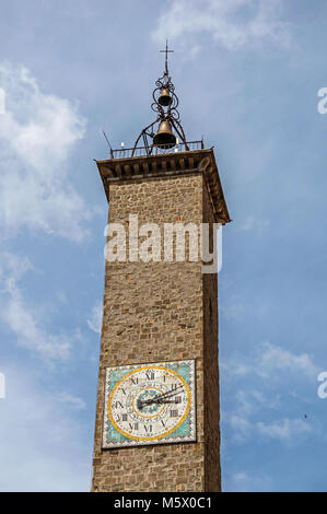 Close-up of old stone campanile with bell an clock in the city center of Viterbo, a pleasant town north of Rome. Stock Photo