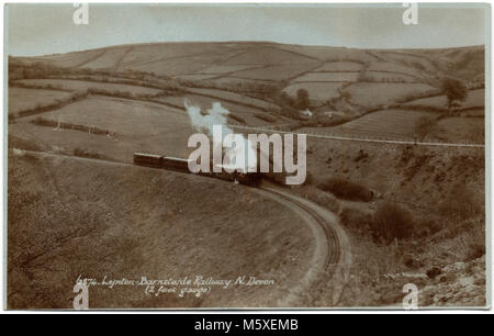 Old postcard of a steam train on the Lynton to Barnstaple narrow-gauge (2ft) railway in North Devon, England, UK.  Photograph circa 1925 Stock Photo