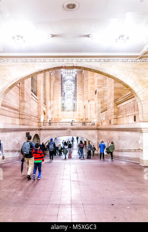 New York, USA - October 29, 2017: Grand central terminal entrance from subway in New York City with arched pathway corridor, many crowd crowded people Stock Photo