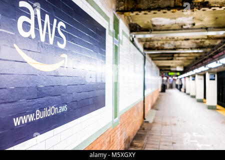 New York City, USA - October 30, 2017: Amazon Web Services AWS advertisement ad sign closeup in underground transit platform in NYC Subway Station, wa Stock Photo
