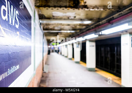 New York City, USA - October 30, 2017: Amazon Web Services AWS advertisement ad sign closeup in underground transit platform in NYC Subway Station, wa Stock Photo