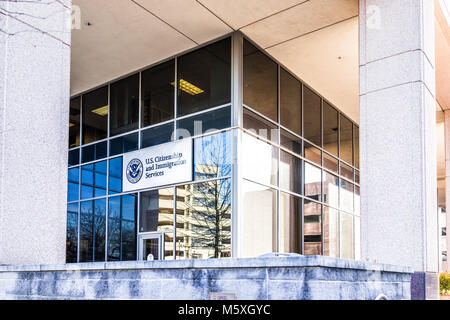 Fairfax, USA - January 26, 2018: USCIS US United States Citizenship and Immigration Services field main office entrance in Virginia with sign Stock Photo