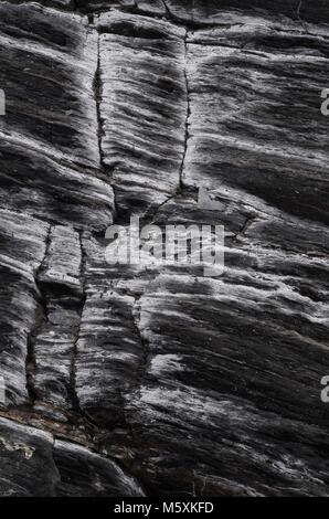 Abstract Photo of Beautiful Metamorphic Slate at Hope Cove, South Devon, UK. Geological Close Up. Stock Photo