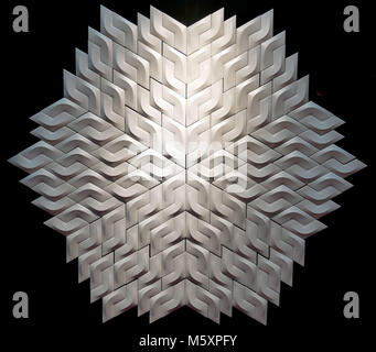 Abstract geometric shining star pattern wallpaper design on black background. Stock Photo