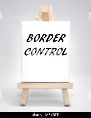 Border control concept white canvas artist easel Stock Photo
