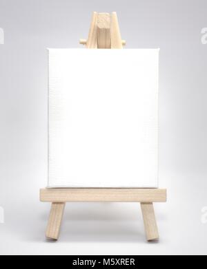 Blank white canvas artist easel Stock Photo