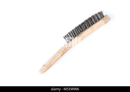 Wooden wire brush isolated on a white background. Strong brush for rust removal. Industrial wire brush. Stock Photo