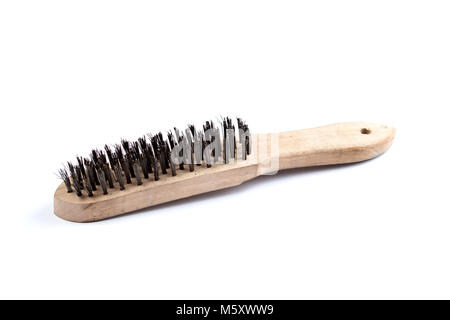 Wooden wire brush isolated on a white background. Strong brush for rust removal. Industrial wire brush. Stock Photo