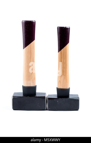 Two sledgehammers with wooden handle isolated on a white background. Construction tools. New sledgehammer. Stock Photo