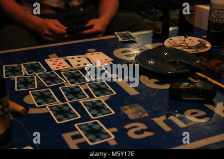 Cards layout for the drinking game 'ride the bus' at a student party Stock Photo