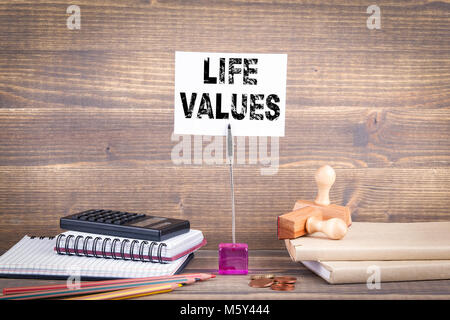 life values. Wooden table with stationery Stock Photo