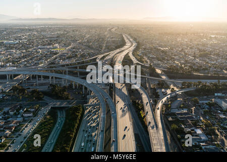 Aerial sunrise view of 105 and 110 freeway interchange ramps in Los Angeles California. Stock Photo