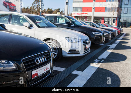 FUERTH / GERMANY - FEBRUARY 25, 2018: Audi emblem on an audi car. Audi AG is a German automobile manufacturer that designs, engineers, produces, marke Stock Photo