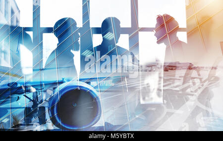 Take off of an aircraft with double exposure of airport Stock Photo