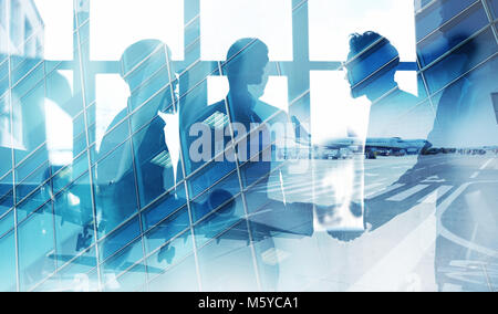 Take off of an aircraft with double exposure of airport Stock Photo