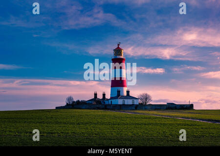 Happisburgh Lighthouse on the  North Norfolk coast is the only independently operated lighthouse in Great Britain. Stock Photo