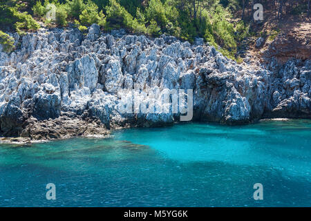 The coast of the sea. Beautiful cliffs over the blue, view from the sea. The unusual landscape. rocks and the sea of Alanya Stock Photo