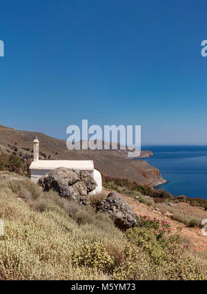 The road to Balos Beach,  little church, Kaliviani, Greece Stock Photo