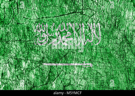 Grudge stone painted Saudi Arabia flag and written arab word shahada which means There is no god but ALLAH Stock Photo