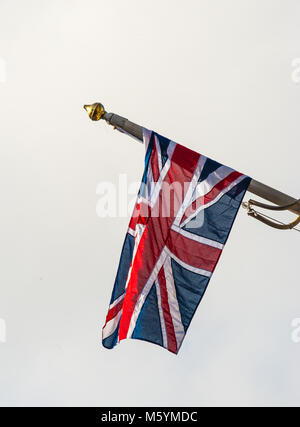 British Union Jack and Scottish Saltire on a top of City Chambers in Edinburgh, Scotland Stock Photo