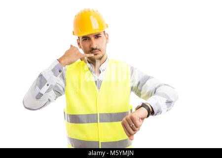 Architect making late for meeting or call me gesture isolated on white background Stock Photo