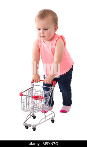 Baby Girl Holding Small Shopping Cart On White Background Stock Photo