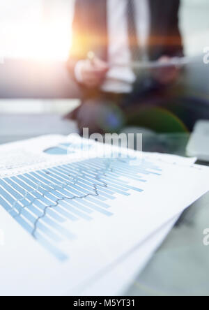 financial graph on the desktop. business background. Stock Photo