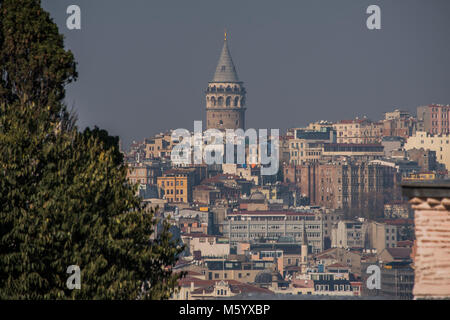 The view from the Topkapı Sarayı towards the Galata Tower - Palace of sultans from 15th- to 19th-century; housed thousands of imperial servants. Center of the historic district, overlooking city across Sea of Marmara, Golden Horn, and Bosporus. Magnificent treasury of jewels (86-carat Spoonmaker Diamond), elaborately tiled harem chambers and kiosks. Stock Photo
