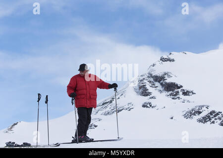 Elderly man skiing in Flims Switzerland Stock Photo