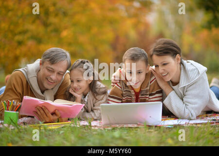 father, mother  and children  Stock Photo