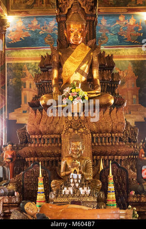 Buddhism - golden Buddha statue in Wat Phnom buddhist temple, Phnom Penh, Cambodia Asia Stock Photo
