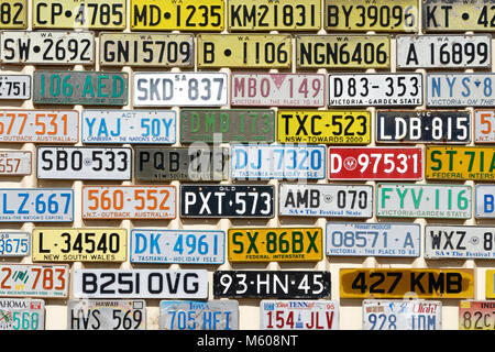Collection of  motor vehicle registration plates displayed on wall, Australia Stock Photo