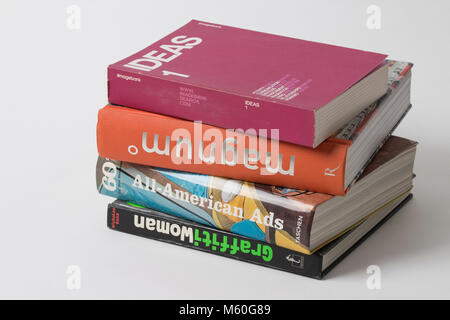a pile of books on white background