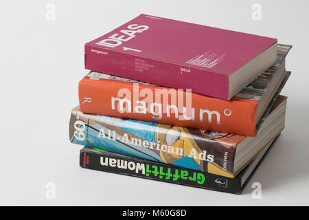 a pile of books on white background Stock Photo