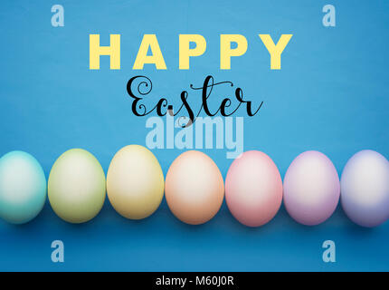 Happy Easter sign with colorful eggs Stock Photo