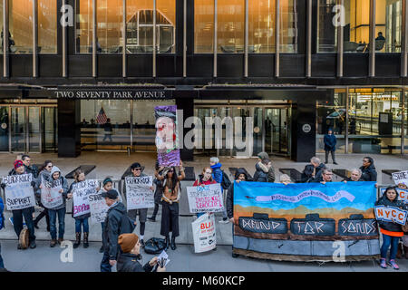 New York, United States. 27th Feb, 2018. Activists rallied outside JPMorgan Chase's headquarters on February 27, 2018; at the bank's annual ‘Investor Day.' Groups ranging from Rainforest Action Network, the American Indian Community House and Sane Energy Project demanded that the bank defund tar sands, one of the dirtiest fossil fuels on the planet. Credit: Erik McGregor/Pacific Press/Alamy Live News Stock Photo