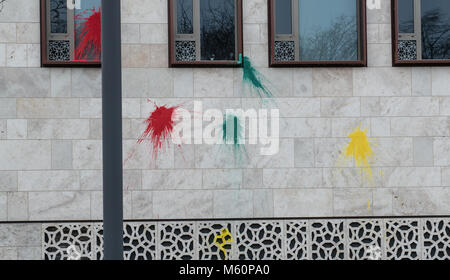 27 February 2018, Germany, Berlin. Colourful paint stains seen on the facade of the Turkish Embassy. So far unknown perpetrators attacked the building with paint bags in the early morning. The used colourd red, green and yellow might symbolise the Kurdish flag. Photo: Paul Zinken/dpa Stock Photo