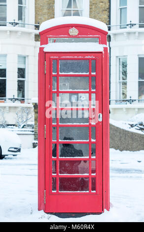 Southend-on-Sea, Essex. 27th Feb, 2018. UK Weather: Snow covered red telephone box, Clifftown Parade, Southend-On-Sea, Essex. Credit: graham whitby boot/Alamy Live News Stock Photo