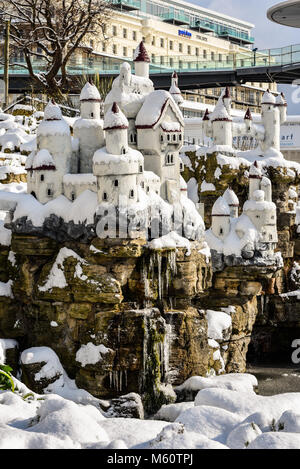 Never Never Land Southend on Sea with snow and icicles from beast from the east. Frozen. Model castle Stock Photo