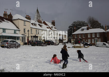 Edenbridge, UK. 27th Feb, 2018. Children have a snowball fight on Westerham,Kent, as the Forecasted Beast from the East passes over the UK giving the coldest temperatures since 1986 Credit: Keith Larby/Alamy Live News Stock Photo