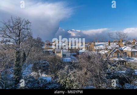 Richmond, London. 27th Feb, 2018. UK Weather: Roof top view shortly after heavy snow shower in Richmond, London, UK. Mid-afternoon 27th February 2018. Credit: Anthony Berry/Alamy Live News Stock Photo