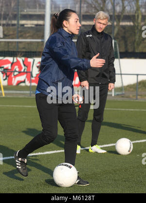 20 February 2018, Germany, Oberhausen: Duygu Erdogan (L), assistant coach of soccer club Rot-Weiss Oberhausen, supervises a short training session on the pitch. 29-year old Erdogan is part of the team of coaches headed by 4th division head coach Mike Terranova. Photo: Roland Weihrauch/dpa Stock Photo