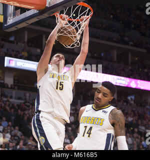Denver, Colorado, USA. 25th Feb, 2018. Nuggets NIKOLA JOKIC, left, dunks the ball during the 1st. Half at the Pepsi Center Sunday night. The Nuggets lose to the Rockets 119-114. Credit: Hector Acevedo/ZUMA Wire/Alamy Live News Stock Photo