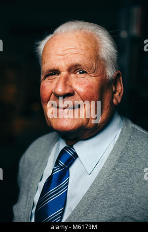 happy senior man smiling at camera Stock Photo