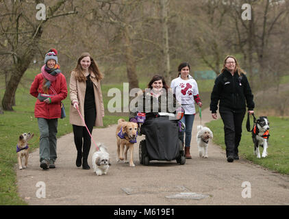 (left to right) Vanessa Holbrow, 47, from Burnham on Sea in Somerset, with her Border Terrier Sir Jack Spratticus; Hannah Gates, 19, from Hazlemere in Buckinghamshire, with her Shih Tzu Buttons; Clare Syvertsen, 29, from Notholt in London, with her Labrador/Golden Retriever cross Griffin; Sarah Mohammadi, 14, from Hayes in west London, with her Cocker Spaniel/Poodle cross Waffle and Gayle Wilde, 39, from Kilsyth in Lanarkshire, with her Border Collie Taz, during a photocall by The Kennel Club in Green Park, London, to announce the finalists for the Crufts dog hero competition, Friends for Life Stock Photo