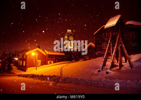 A beautiful night landscape of a historic town Roros in central Norway. Winter sceney on the streets of beautiful town. World heritage site. Stock Photo